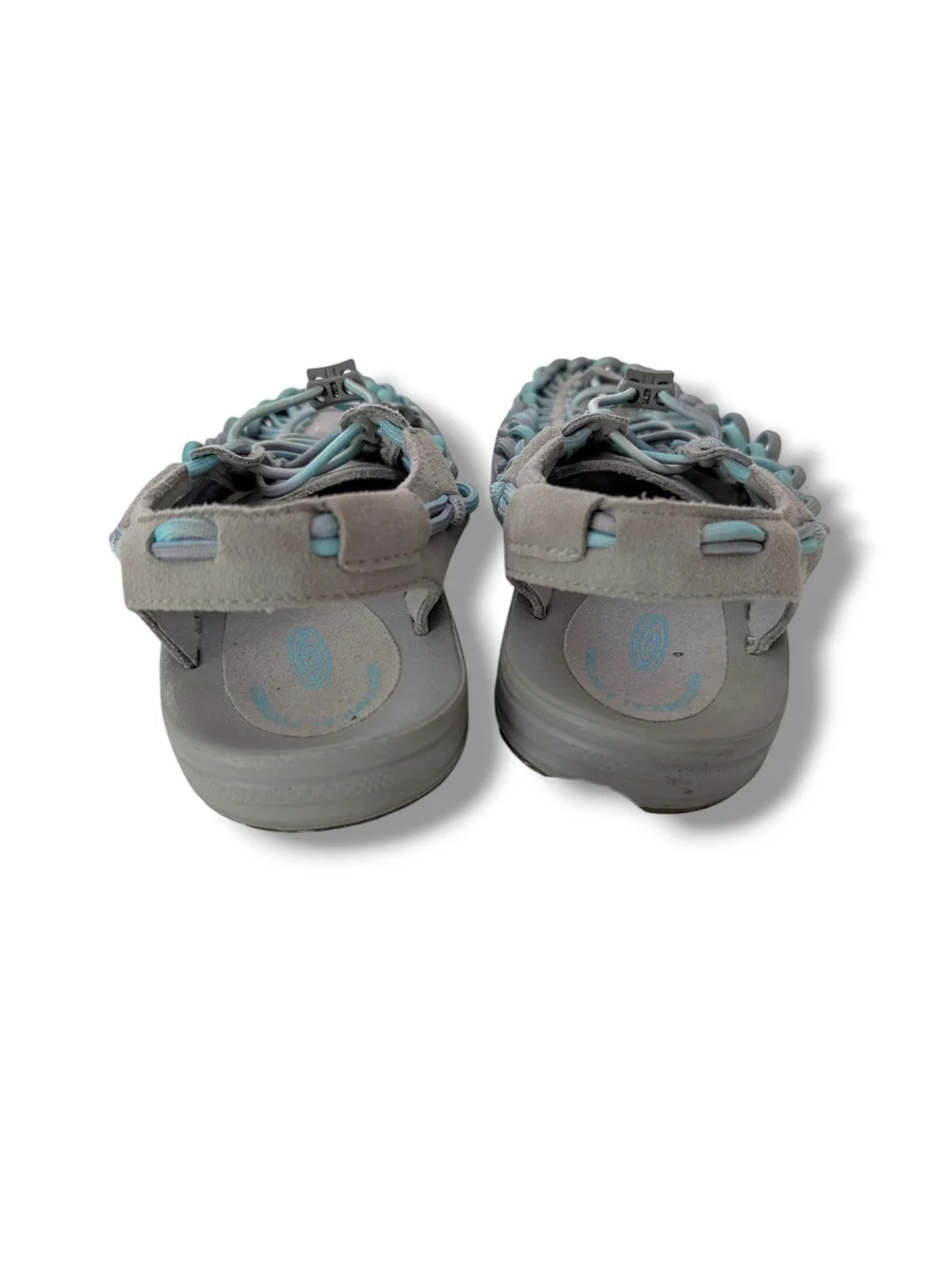 NWOT KEEN Women's Uneek open-air cord sandals in a grey and aqua blue colorway